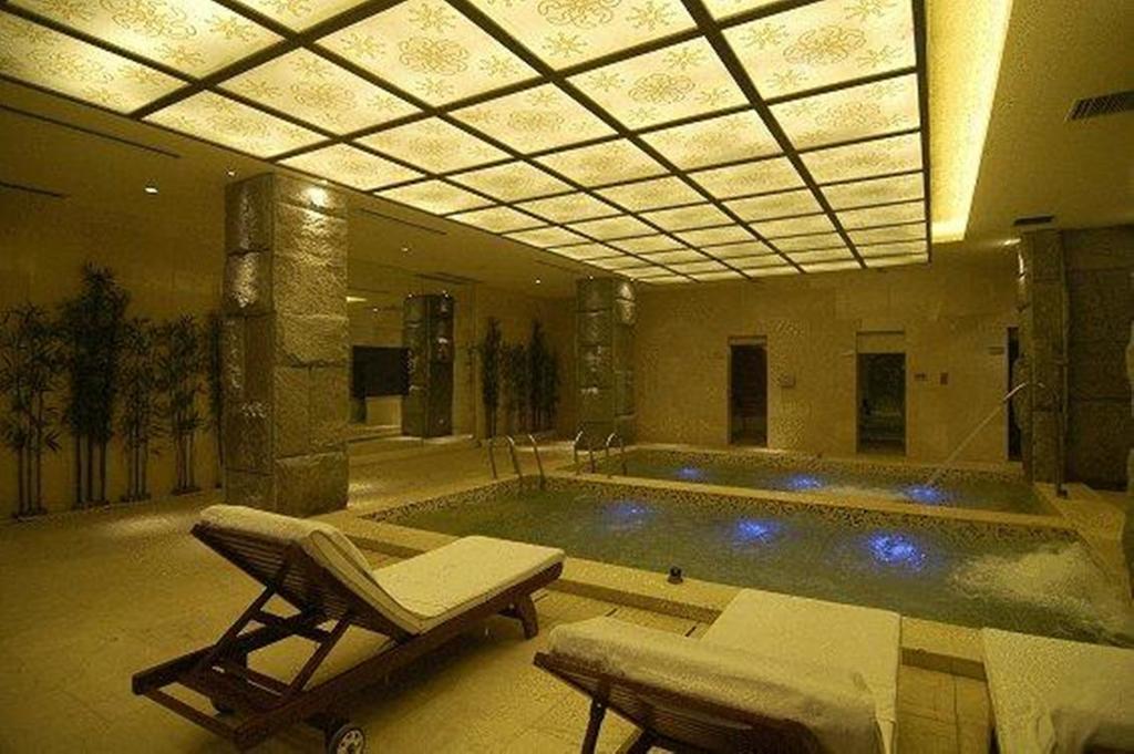 New Century Grand Hotel Кайфын Экстерьер фото
