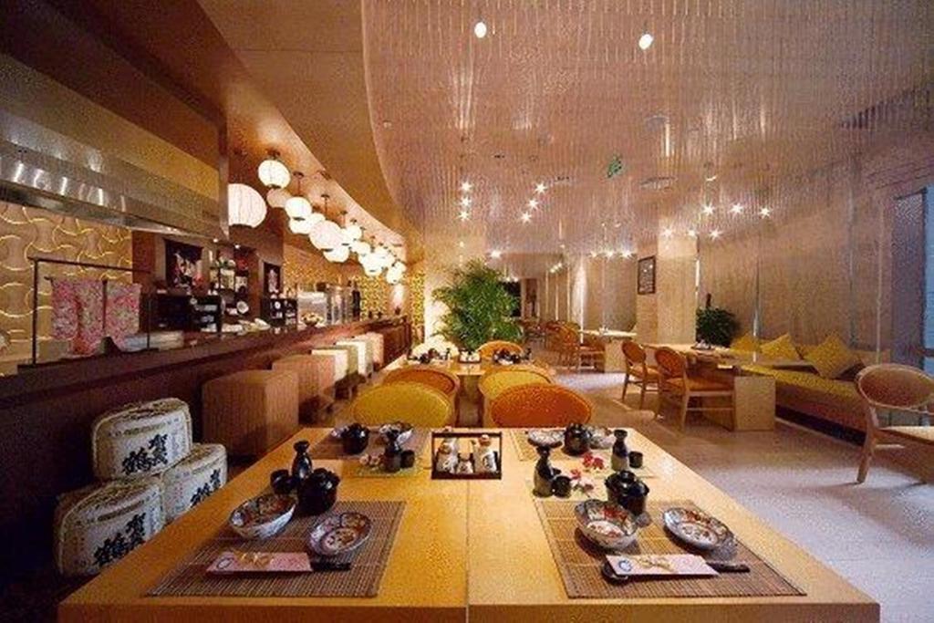 New Century Grand Hotel Кайфын Экстерьер фото